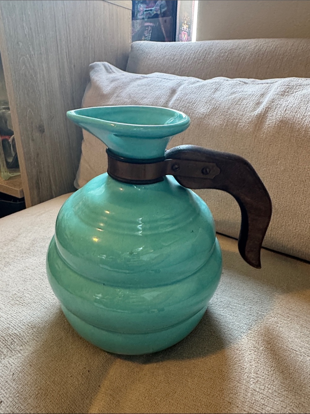 Turquoise Ceramic Pitcher with Dark Wood Handle